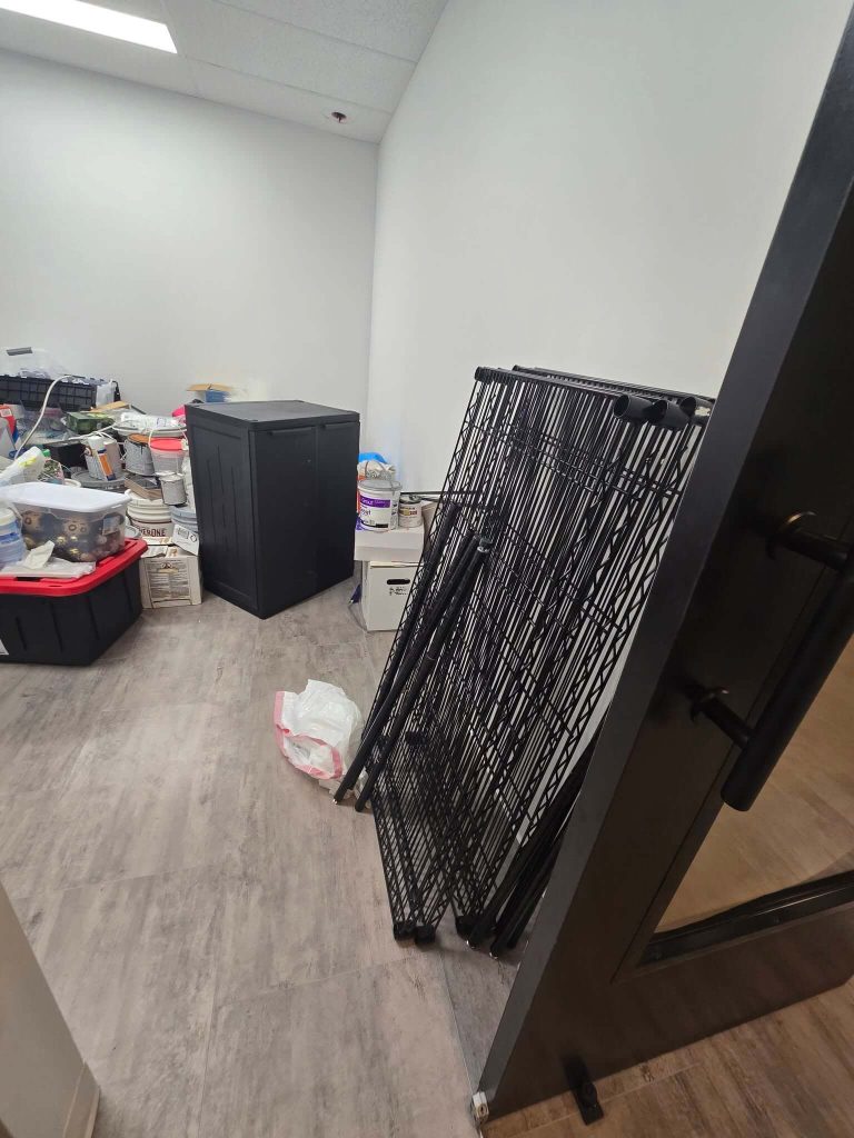 Furniture and household items awaiting a basement cleanout