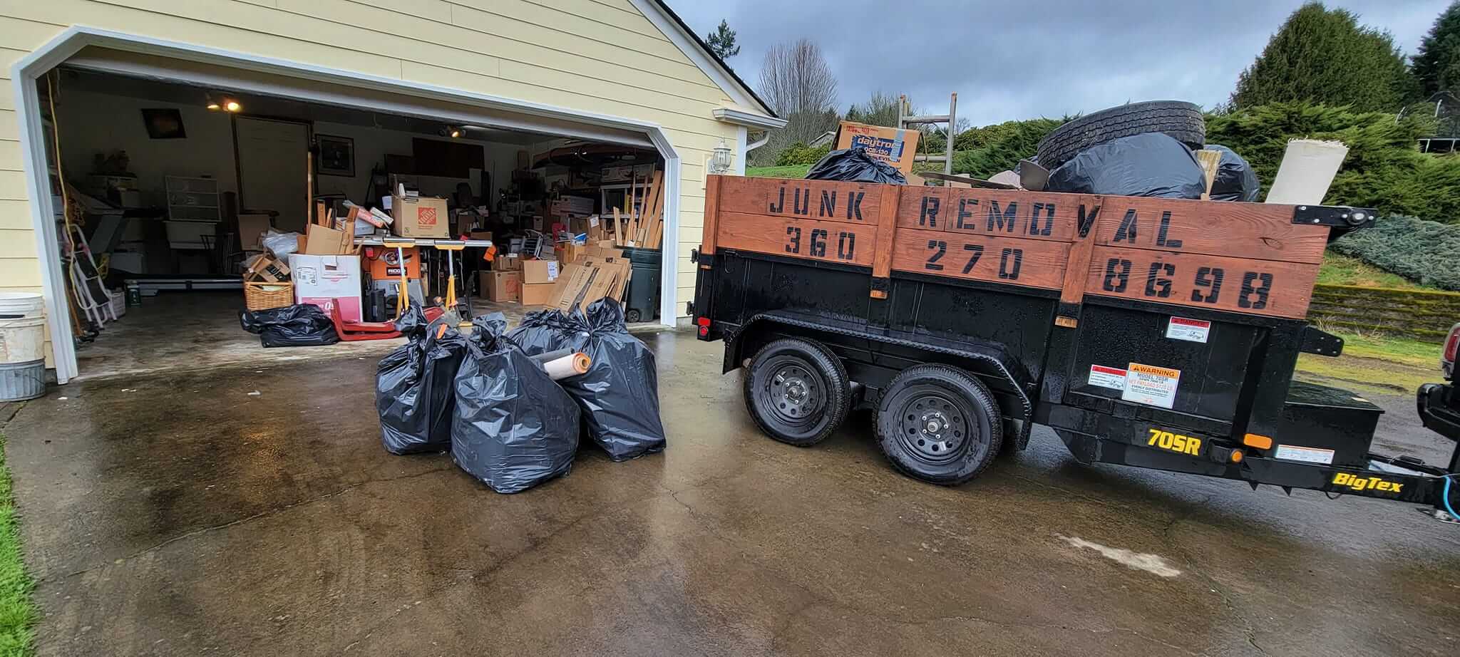 Garcia’s hauling truck at a home and garage cleanout