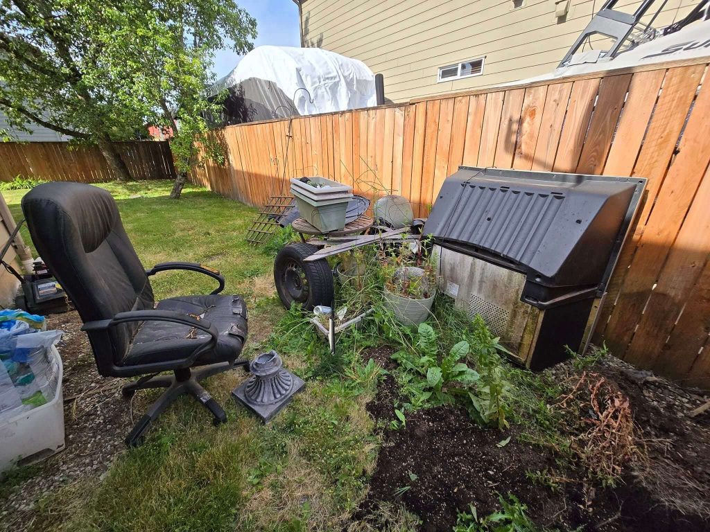 Bulky items ready for removal from a rental property