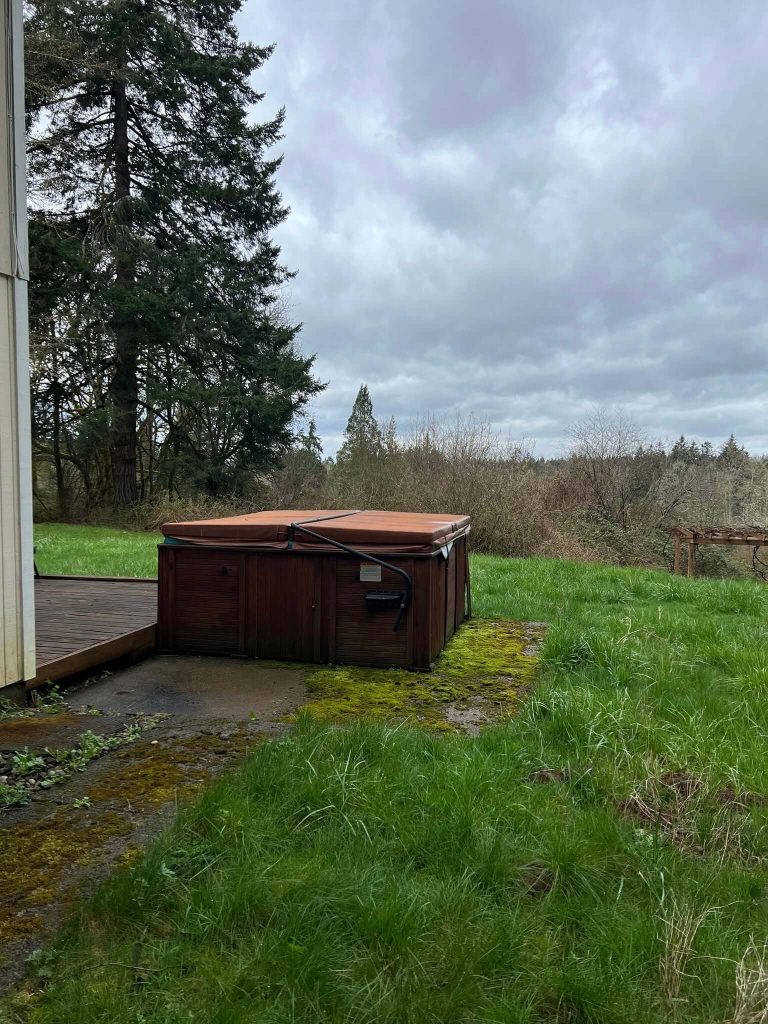 An outdoor hot tub ready for removal