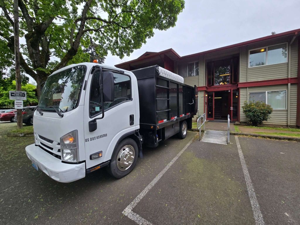 Garcia’s hauling truck serving a residential property