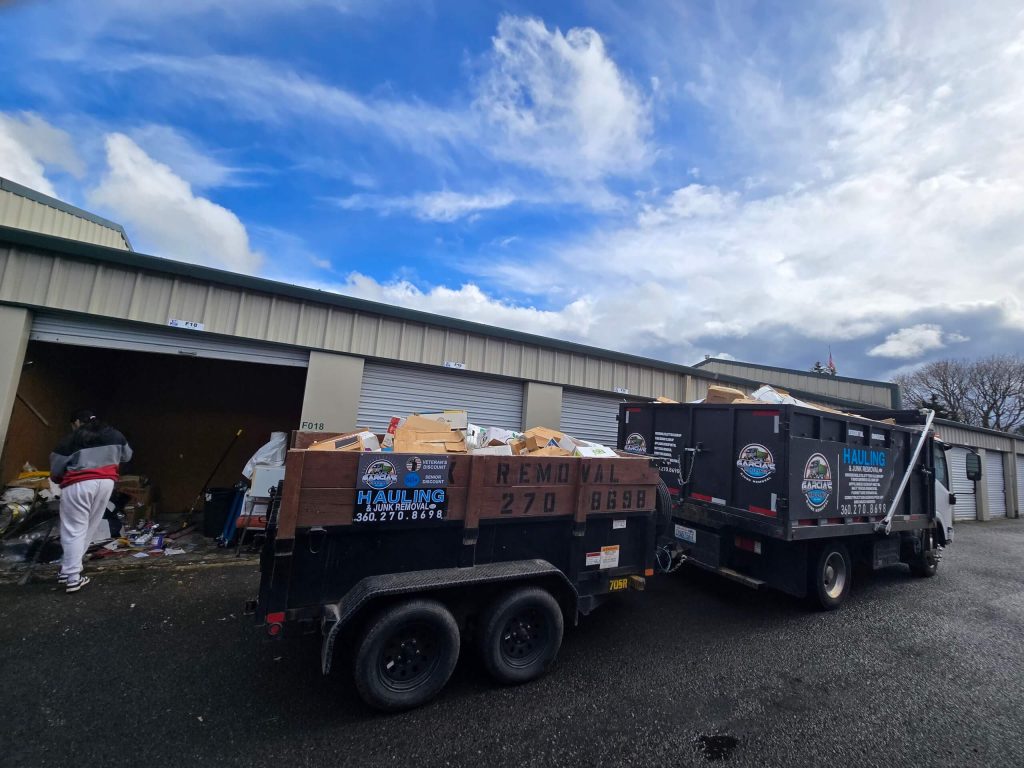 Garcia’s crew and hauling trailer at a storage facility